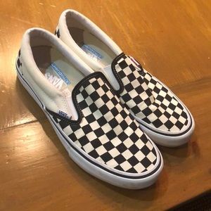 Black and White checkered Vans